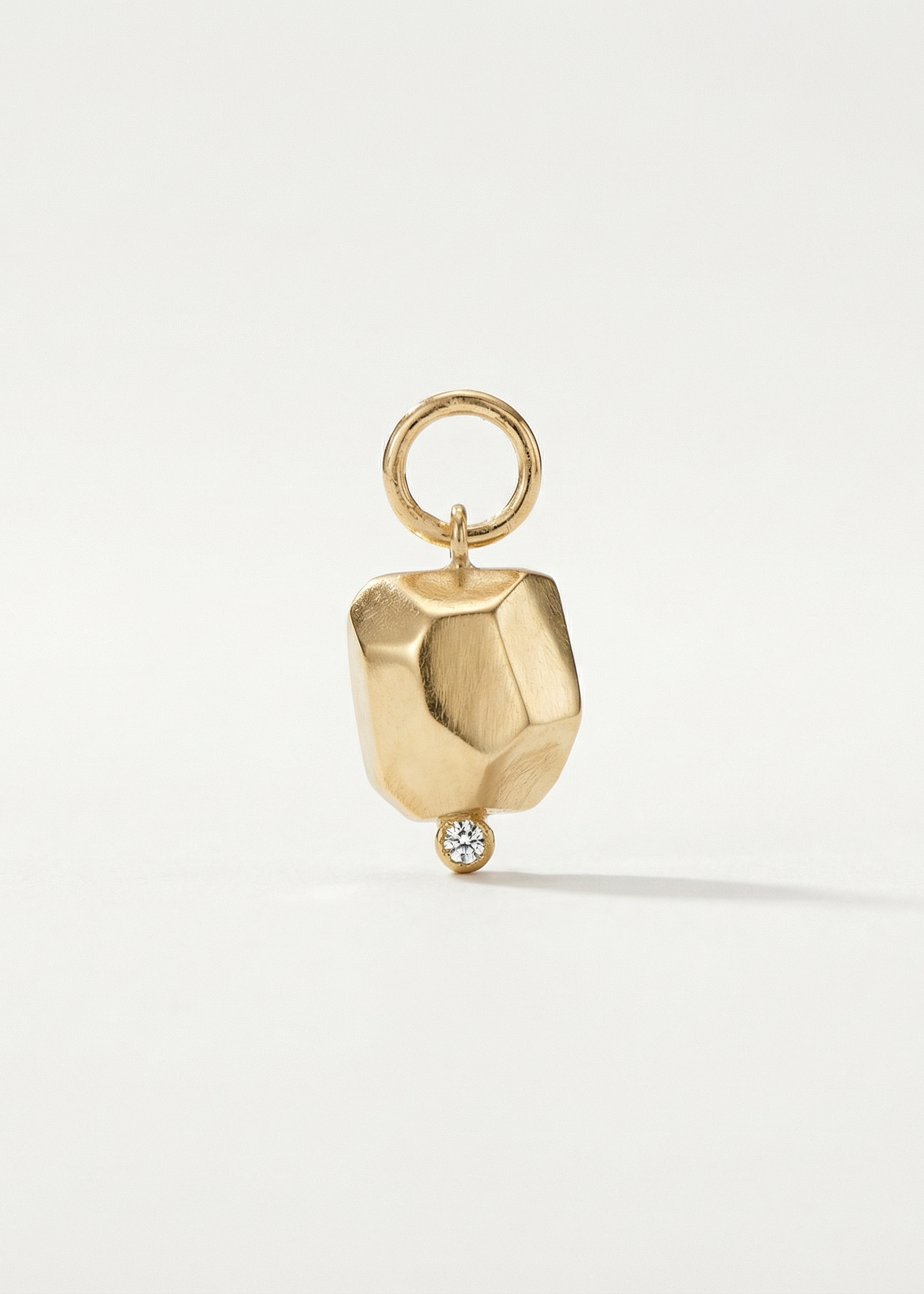 Pingente Pepita Ponto de Luz em Ouro Amarelo 18k
